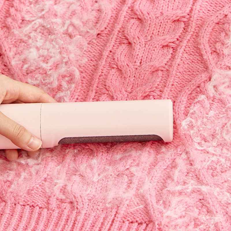 Self-cleaning lint brush base and handle detail