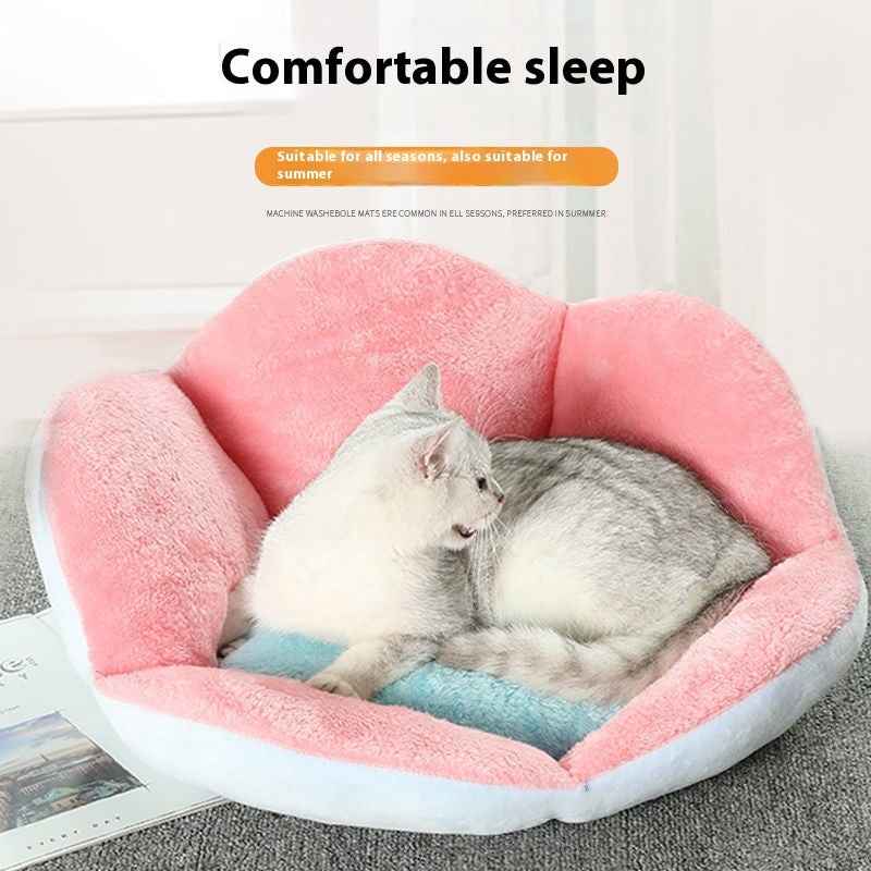 Paw-shaped pet bed cushioned surface for cats and small dogs